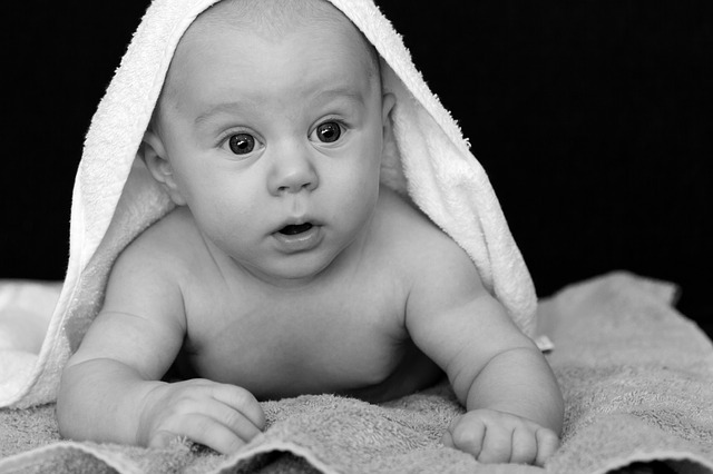 baby in towel B&W